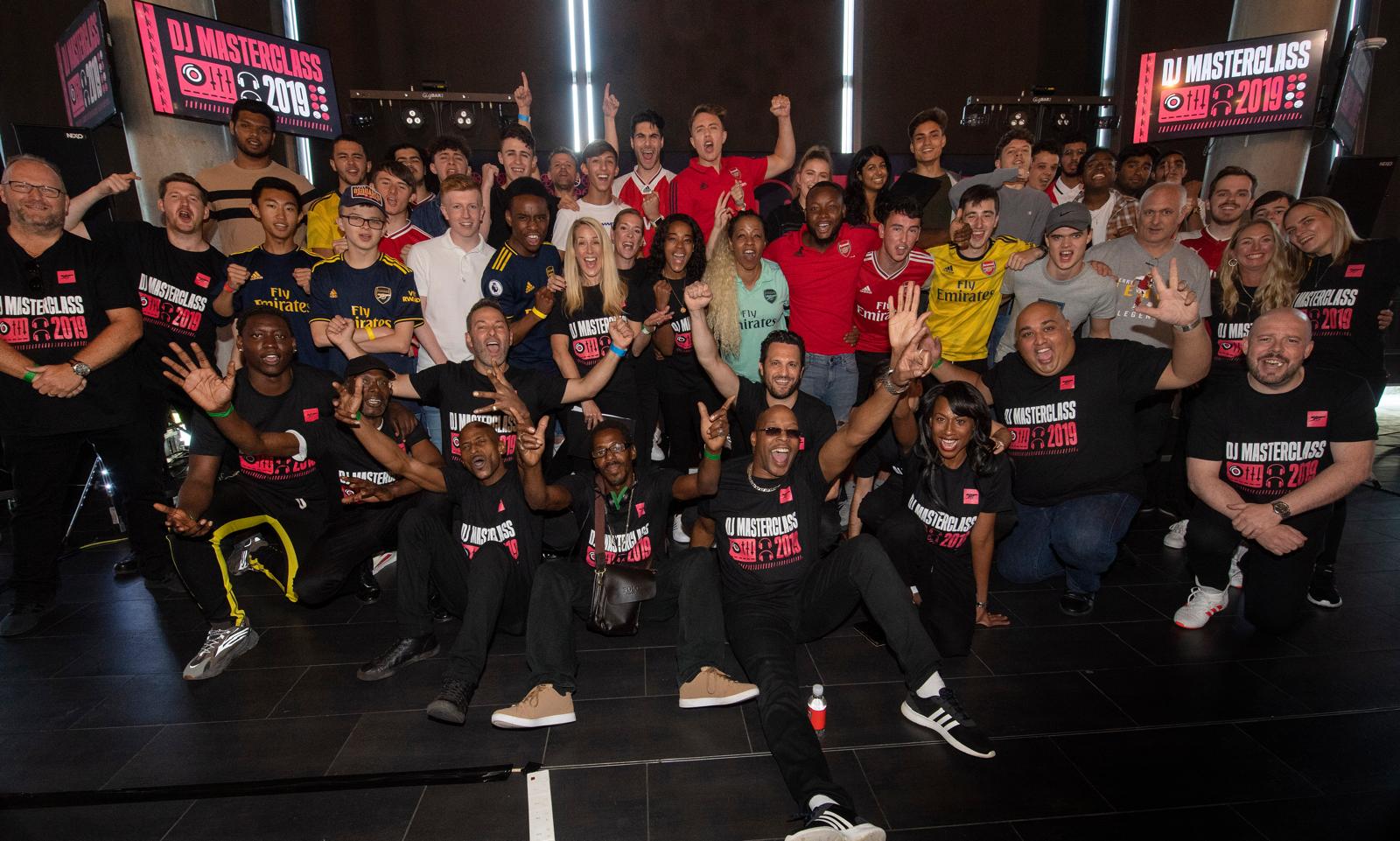 DJ Masterclass 2019 group celebrating at Arsenal FC