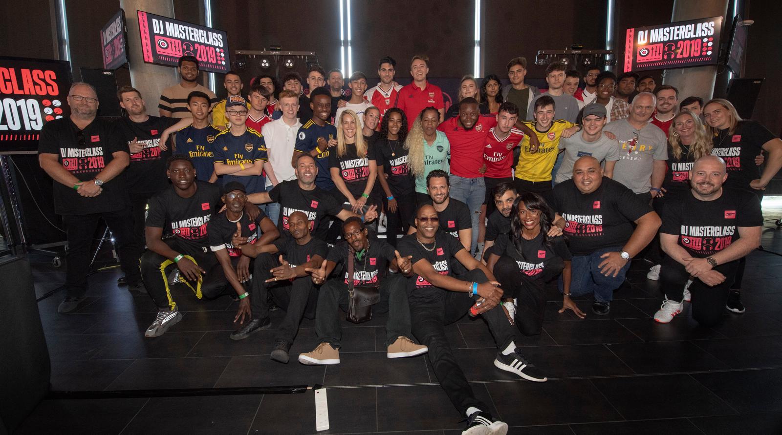Group photo of DJ Masterclass 2019 participants at Emirates Stadium