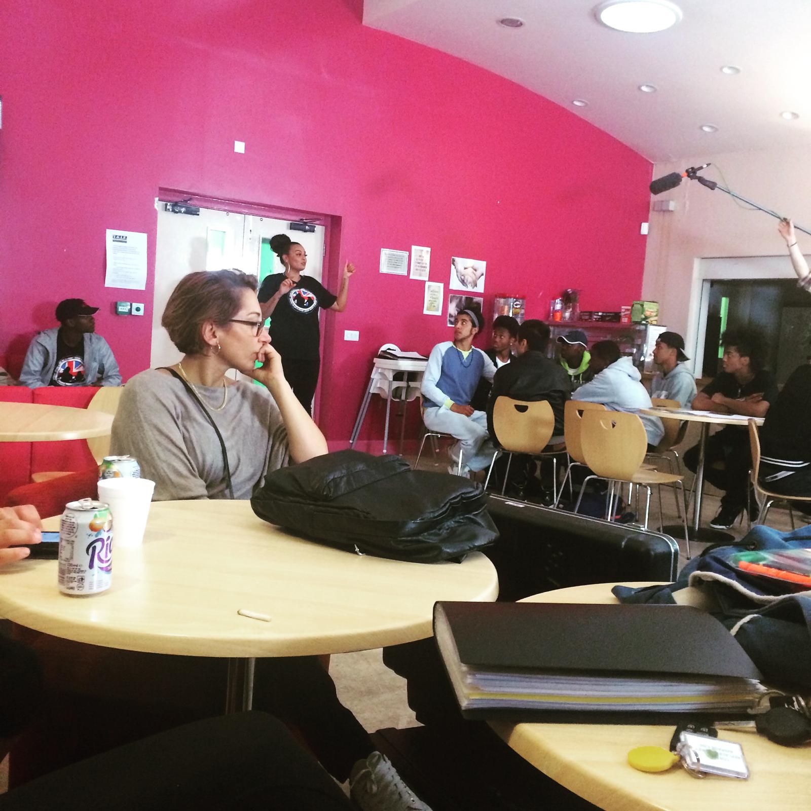 Workshop session with young participants being filmed