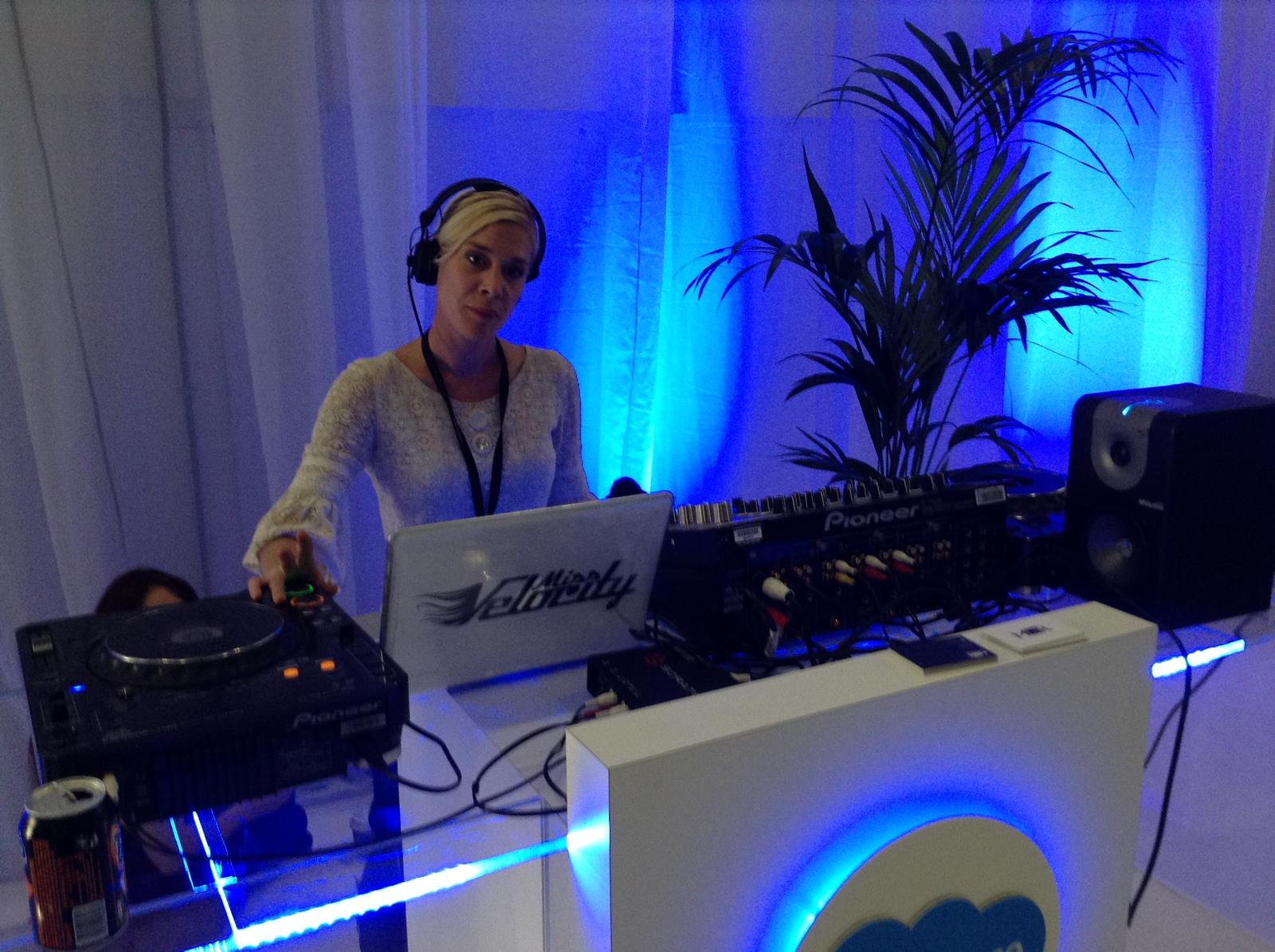 DJ mixing live at a corporate exhibition stand