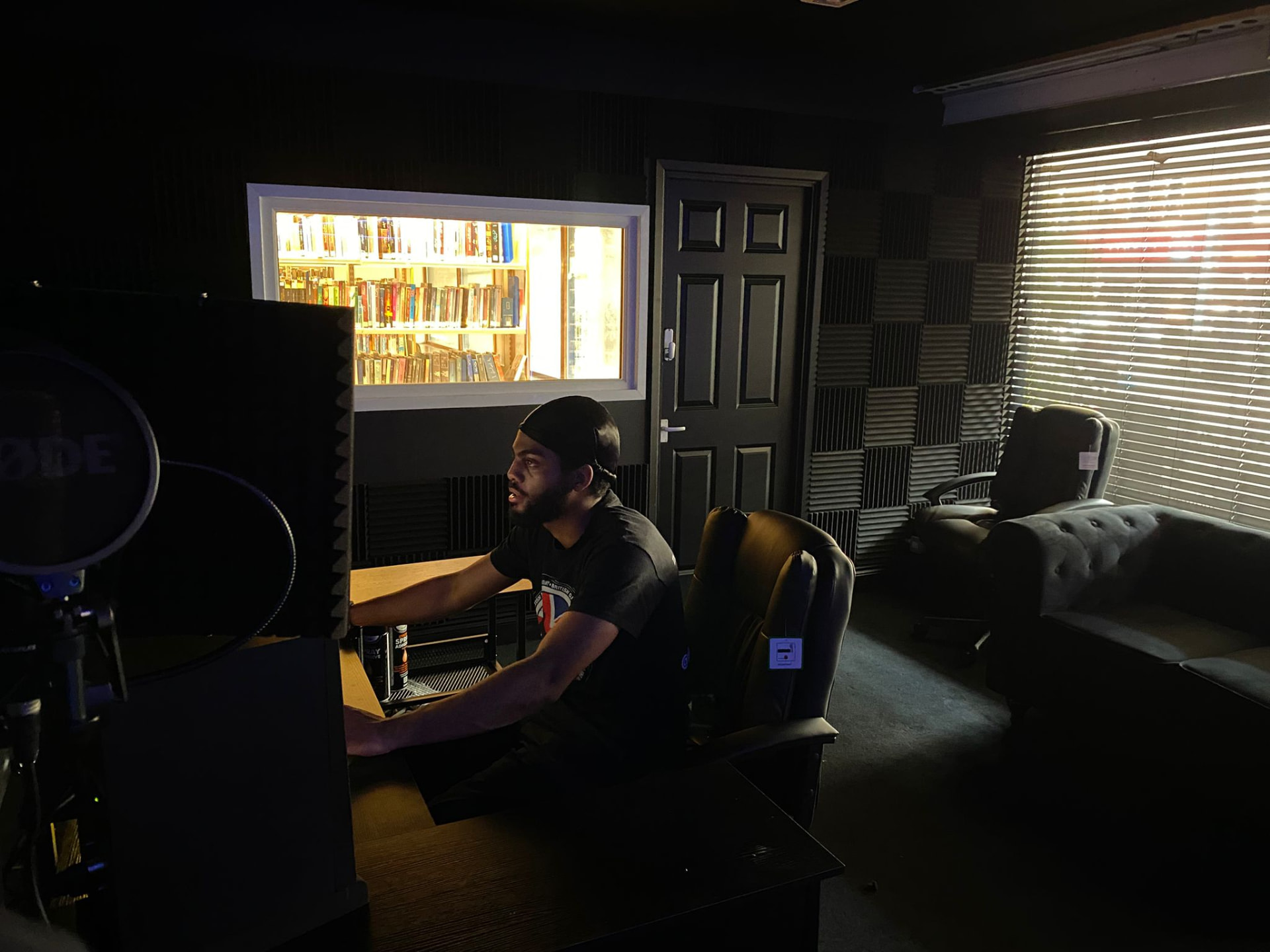 Producer at the mixing desk in the studio